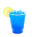 ice cold electric blue lemonade with a slice of lemon in a disposable cup.